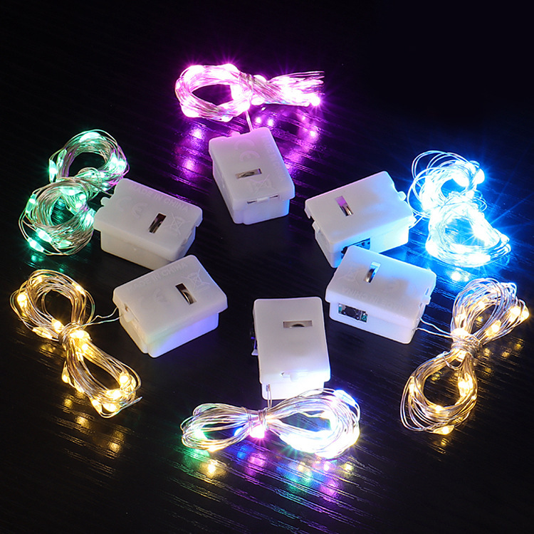 Bulk wholesale of LED button batteries, small white boxes, colorful flower light strings, Christmas tree decorations, copper wire ambient light strings details Picture