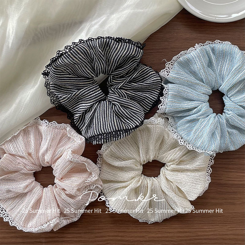 The new Korean-style simple and elegant lace-trimmed large intestine hair band is a versatile accessory for girls. The retro high-elasticity bun hair is perfect for women details Picture