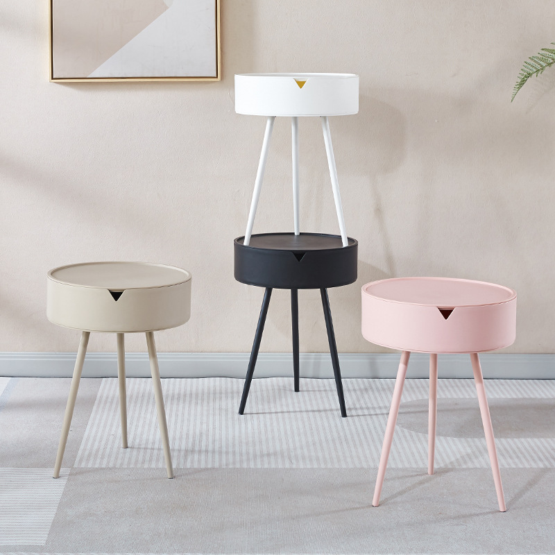 A round triangular table, a small table by the bedside of a girl in the bedroom, a modern and simple mini round table details Picture