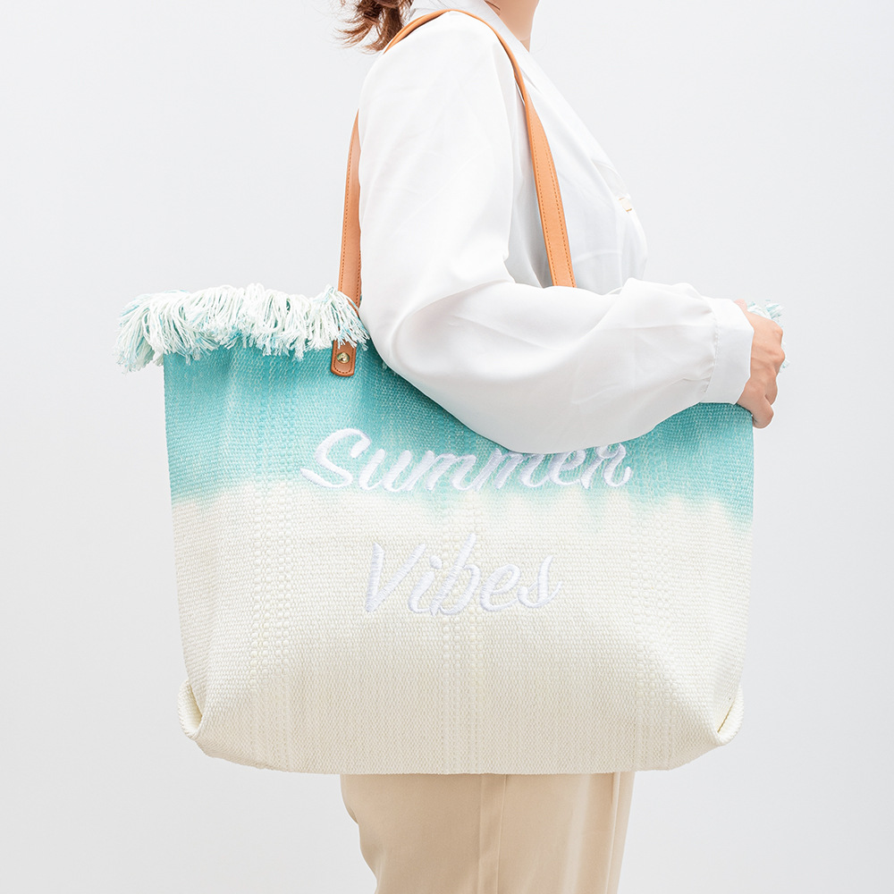 Embroidered tote bag, commuter magnetic buckle handbag, seaside vacation underarm bag, new women's beach single-shoulder canvas bag details Picture