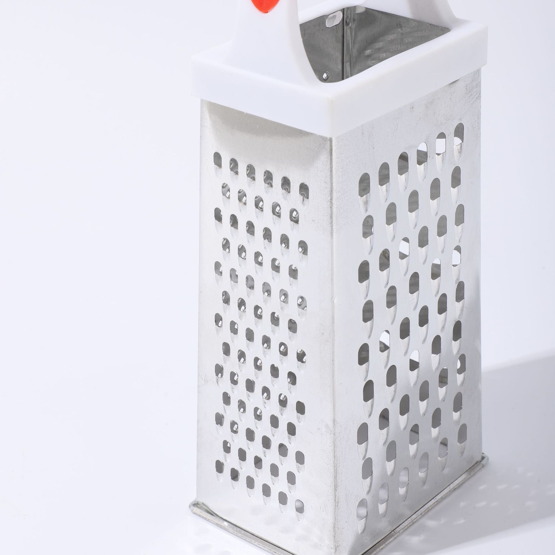Wholesale four-sided three-dimensional stainless steel vegetable slicers, fruit and vegetable peels, and household multi-functional kitchen utensils with handles Application Scenario
