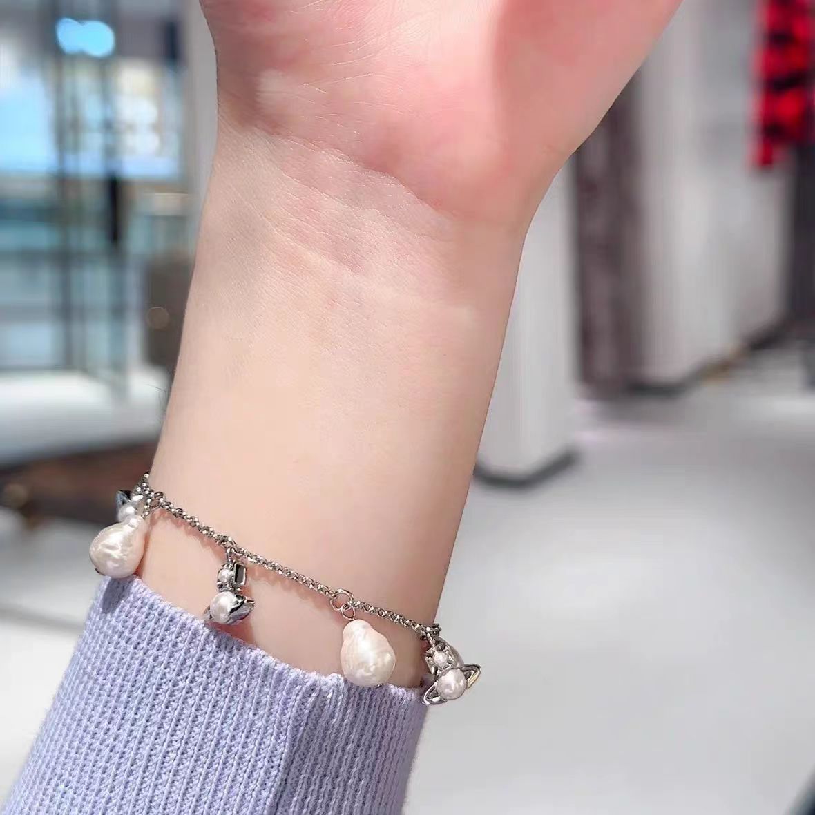 【 Factory Direct Sales 】 Wholesale and consignment of the Western-style Queen of the West Baroque pearl tassel small Saturn necklace for women pic 11