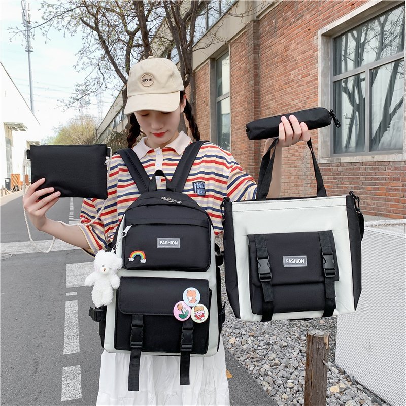 跨境初高中学生书包大容量旅行户外简约四件套背包新款百搭双肩包产品图