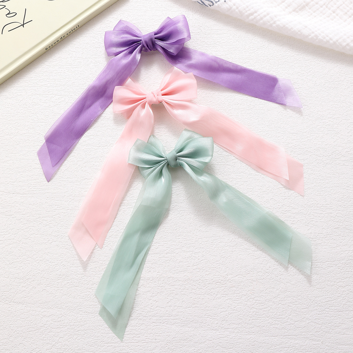 Customized cross-border best-selling bow hair clips and hairpins from the hair accessory factory, Korean-style commuter fabric bow hair clips and hairpins Application Scenario