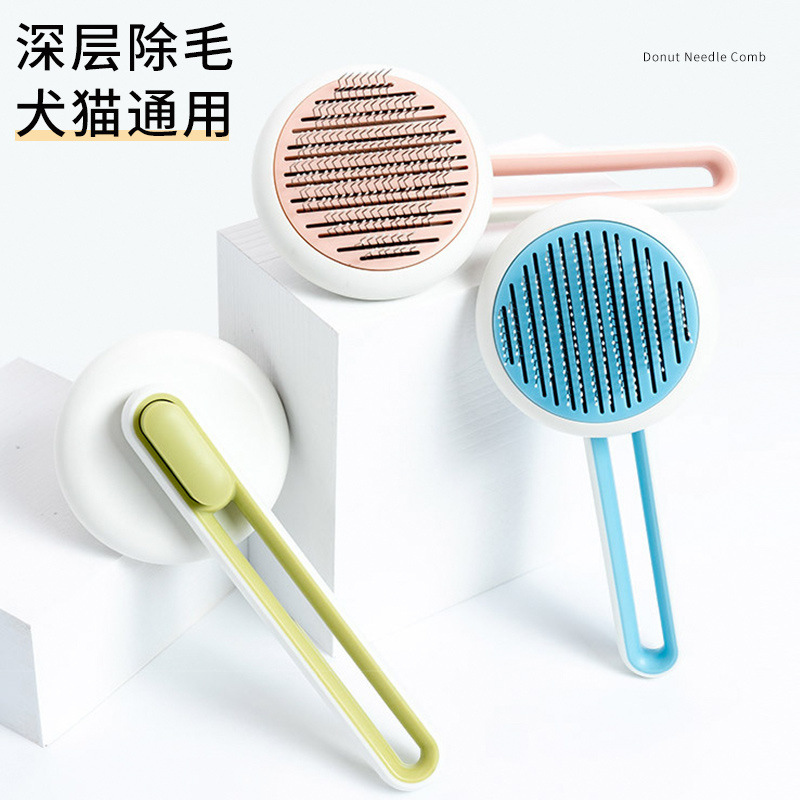 Pet hollowed-out hair removal massage combs, stainless steel brushes for cats, dog hair removal brushes, wholesale of pet supplies