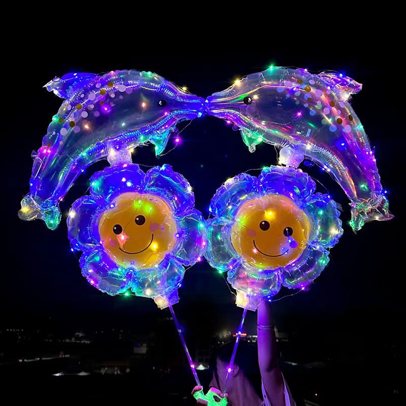 Luminous hand-held net red new magic night market kindergarten to push small gifts birthday decoration stall dolphin balloon Application Scenario