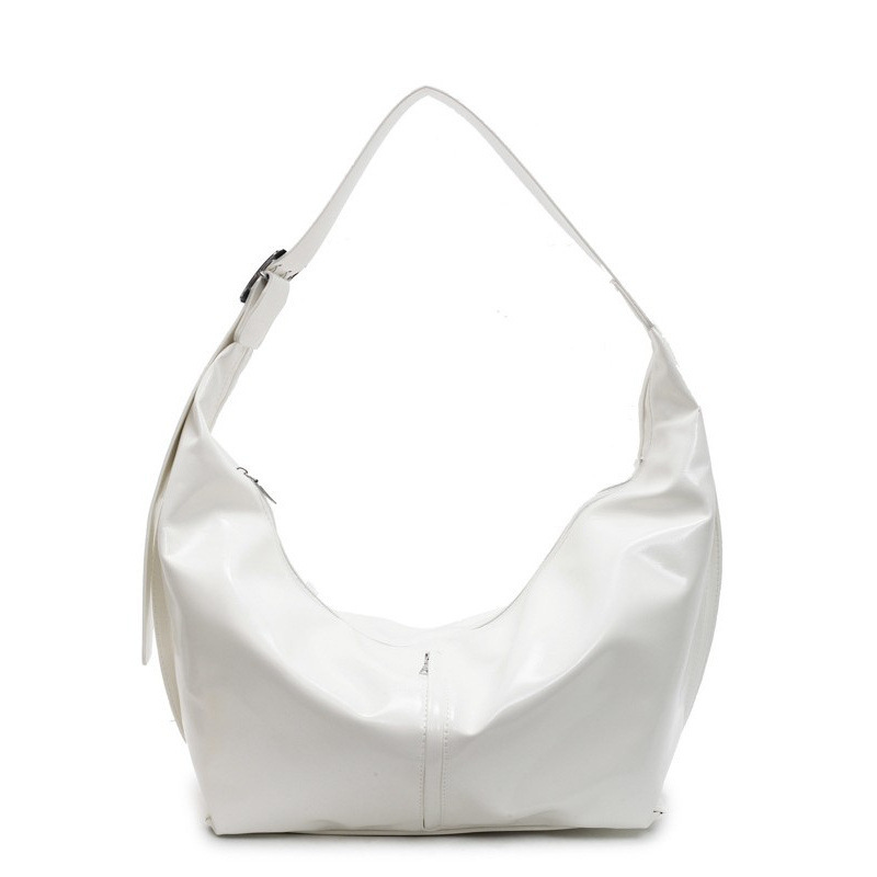 大容量腋下包女2025新款春夏季休闲百搭单肩斜挎包流行通勤饺子包白底实物图