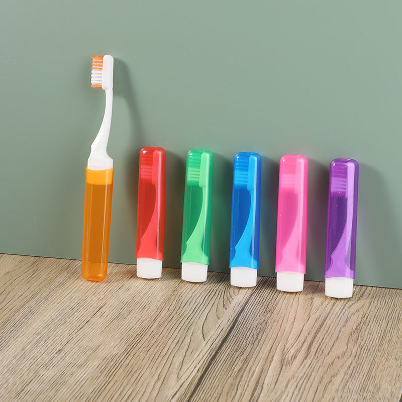 Foldable toothbrush comb