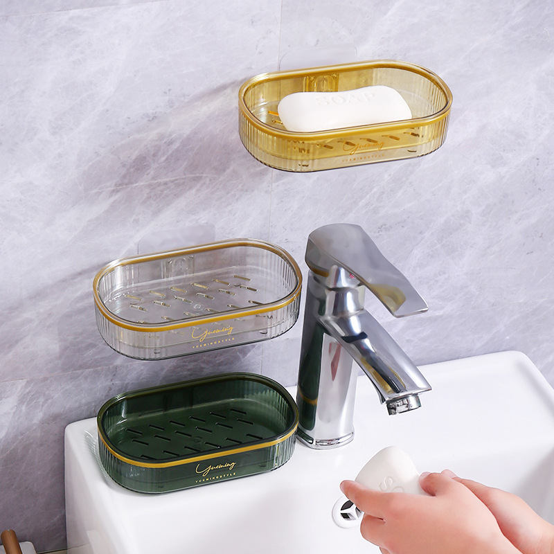 The light luxury PET household soap box can be wall-mounted, with a draining storage rack and a soap dish tray. It is creative and does not require drilling