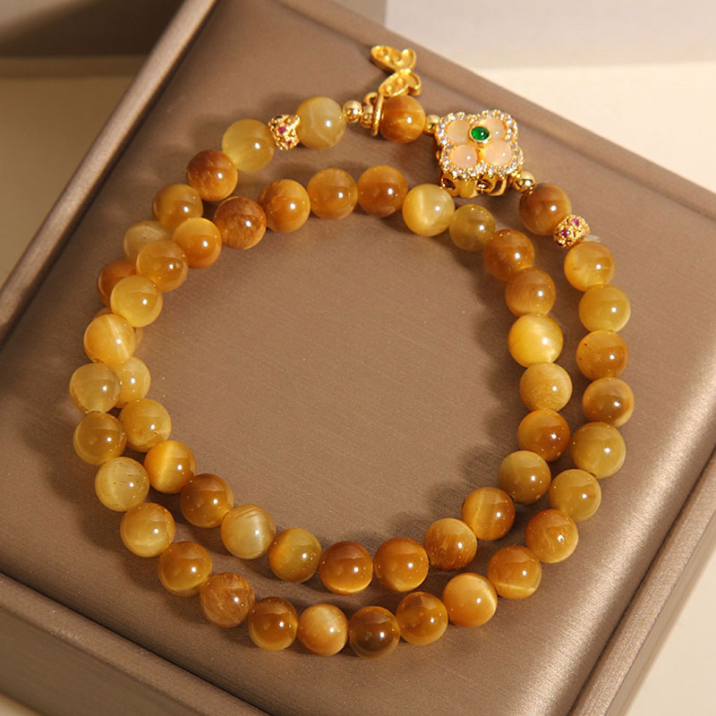 A natural gold tiger's eye double-ring bracelet for women, a light luxury, niche and exquisite four-leaf clover crystal bracelet as a gift for your best friend Item Picture