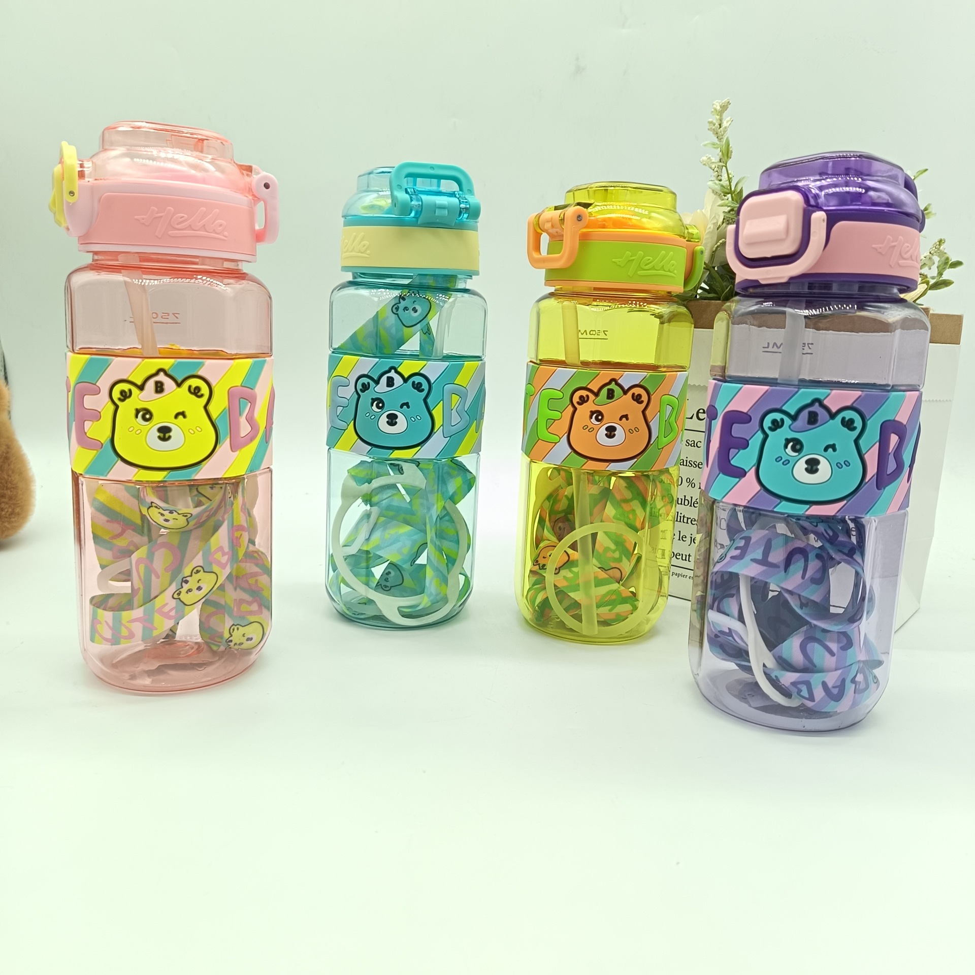 Amazon's best-selling bear octagonal leather strip space cup with a bouncing lid and a shoulder strap, student and children's sports water bottle and cup full figure