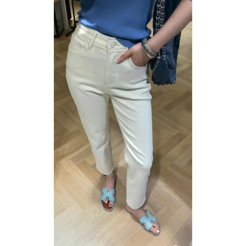 2024 Spring/Summer new European style high-waisted slimming cigarette tube narrow version jeans, baguette straight leg slightly flared white jeans for women details Picture