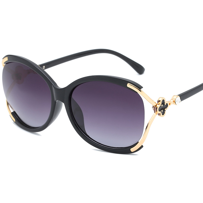 Wholesale of new four-leaf clover women's polarized sunglasses with diamond-encrusted individual and fashionable outfits, Korean-style large frame glasses