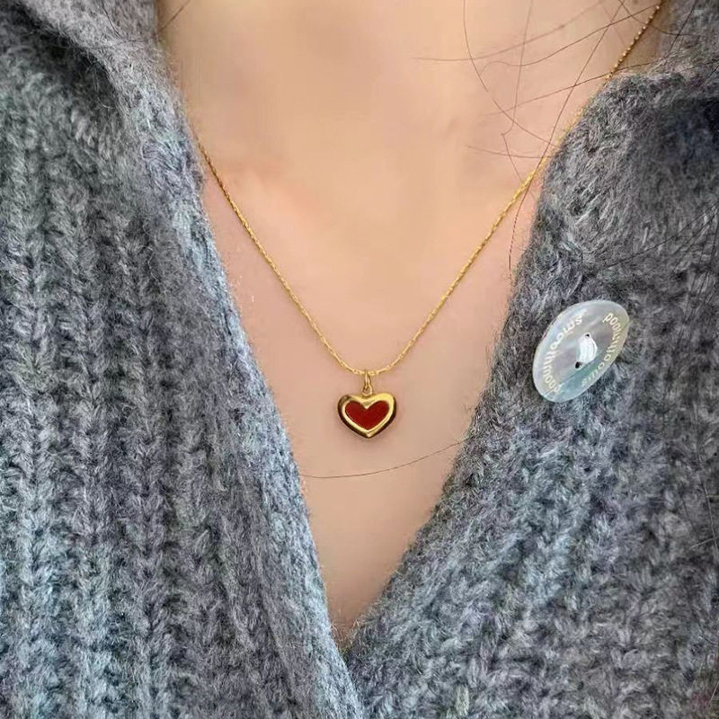 This sweet red heart-shaped necklace from Korean style is elegant, delicate and compact. It is made of titanium steel and plated with 18K gold, making it a versatile collarbone chain for women details Picture