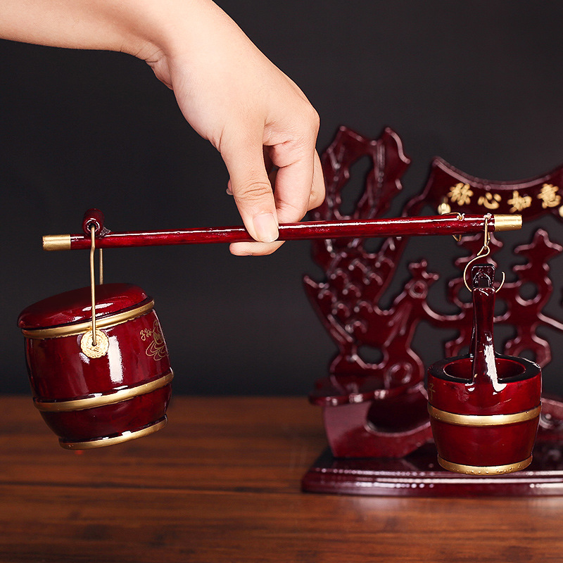 Three-piece set of solid wood and rosewood color small descendants bucket set, wedding toilet, heart-to-heart lock, dowry decoration Application Scenario