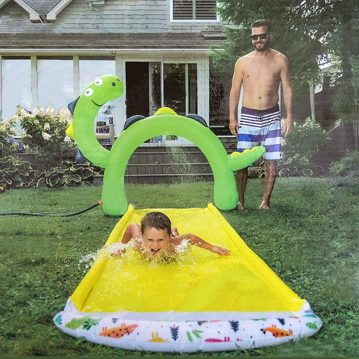 PVC 草坪单人滑水道 恐龙喷水拱门儿童戏水滑道洒水垫子图