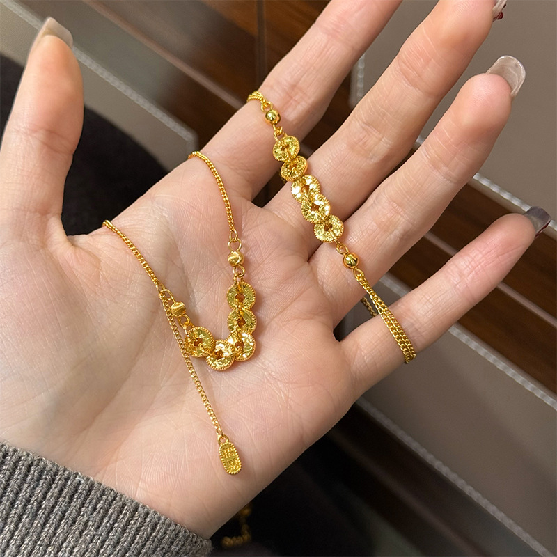 New light luxury, fashionable and exquisite copper coin broken ice necklace, simple yet high-end, retro and versatile, elegant collarbone chain for women