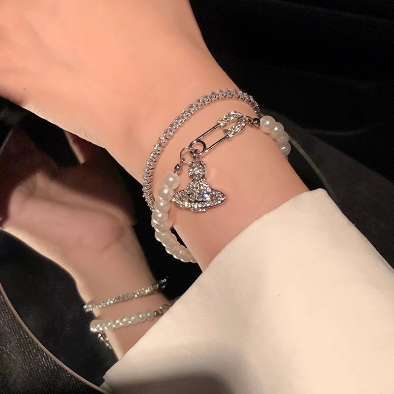 Planeta saturno perla pulsera mujeres luz lujo nicho de alto nivel sentido lleno de circonitas perforadas pulsera exquisita moda de la mano details Picture
