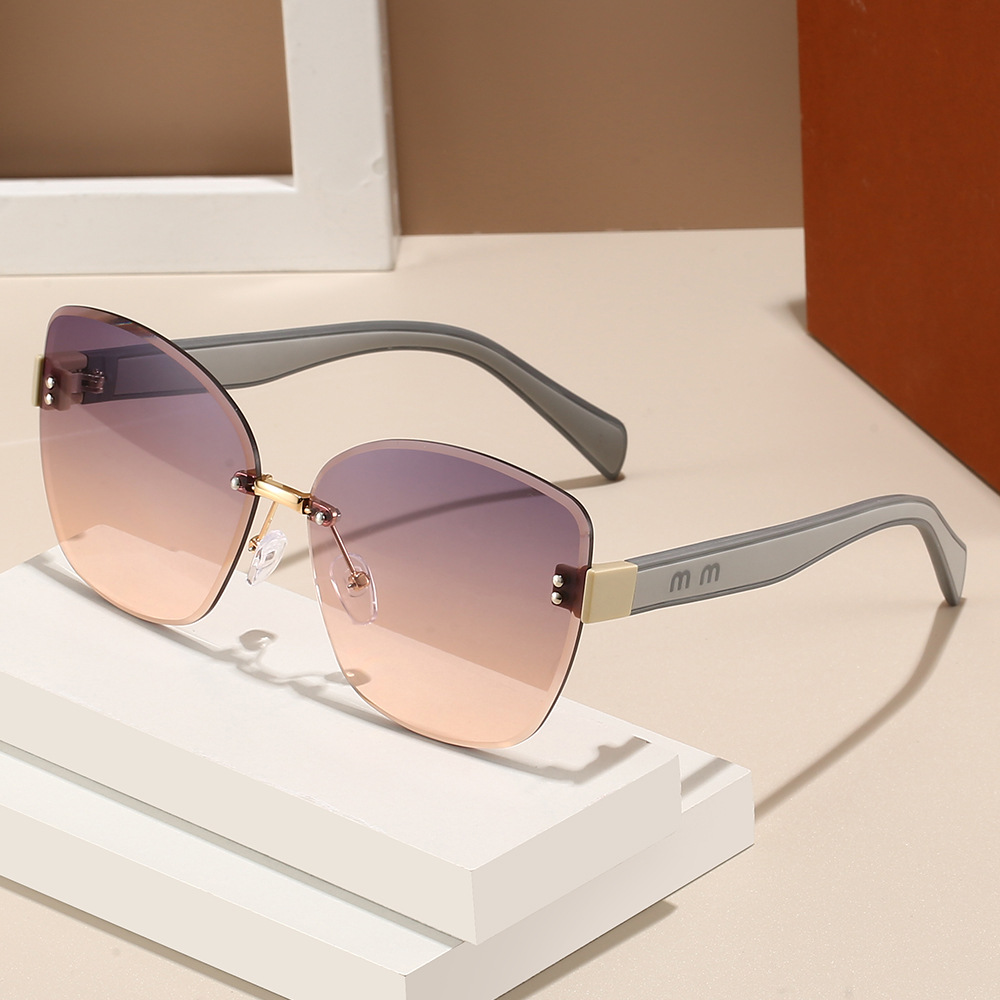 2025 New women's sunglasses, European and American fashion frameless trimmed sunglasses, slimming and UV-protective sunglasses