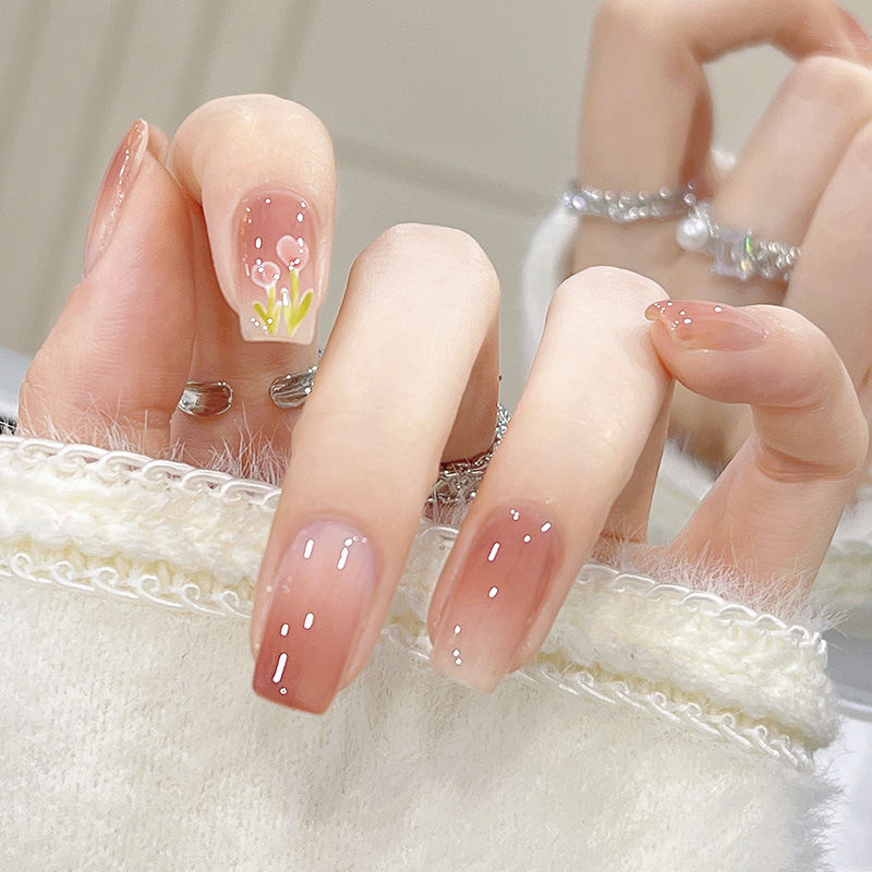 Close-up of crystal frost nail design showing shimmer and texture