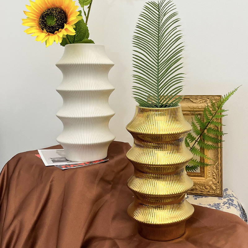 وصف مختصر لأزهار الخزفية الخلاقة في شكل أزهار مجففة في غرف المعيشة Specification image