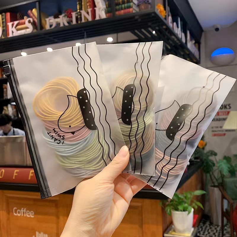 Simple Japanese and Korean hair ties without seams, 100-piece bagged colorful hair ties, basic braided hair bands, leather band hair accessories