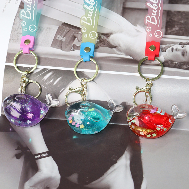 Sand bottle with oil, dolphin and whale keychain, luminous snowflake, sparkling message bottle, exquisite children's schoolbag, small pendant Specification image