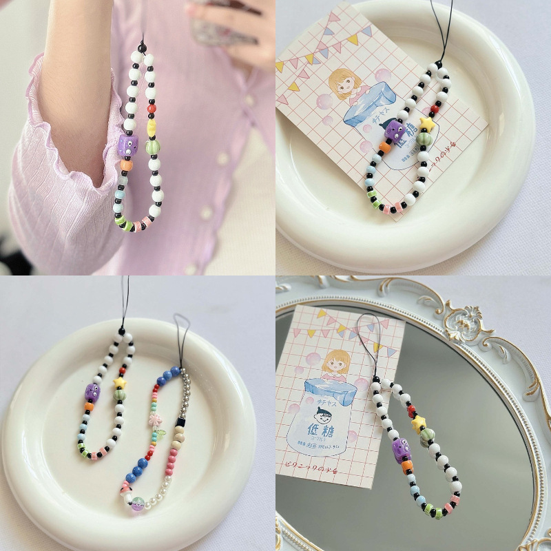 马卡龙色陶瓷珠中珠手机挂绳日韩ins风手工串珠花朵手机链手腕绳