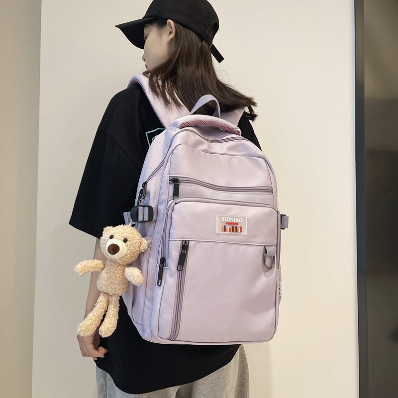 T Simple men's versatile travel backpack, casual large-capacity backpack, girls' junior high school and senior high school college schoolbag details Picture