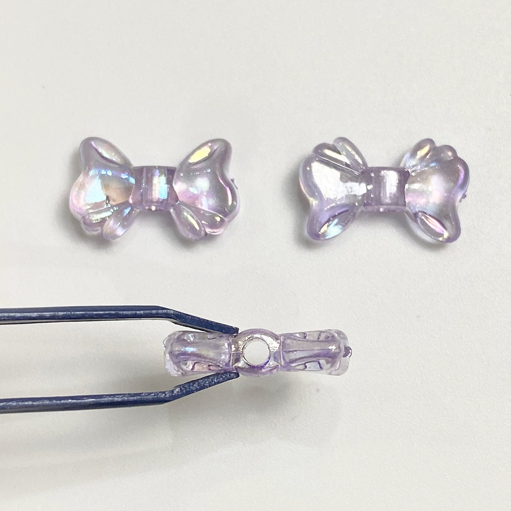 DIY jewelry accessories, nail patches, small bows, transparent color-coated oil paintings, acrylic mobile phone chains, beaded materials Specification image