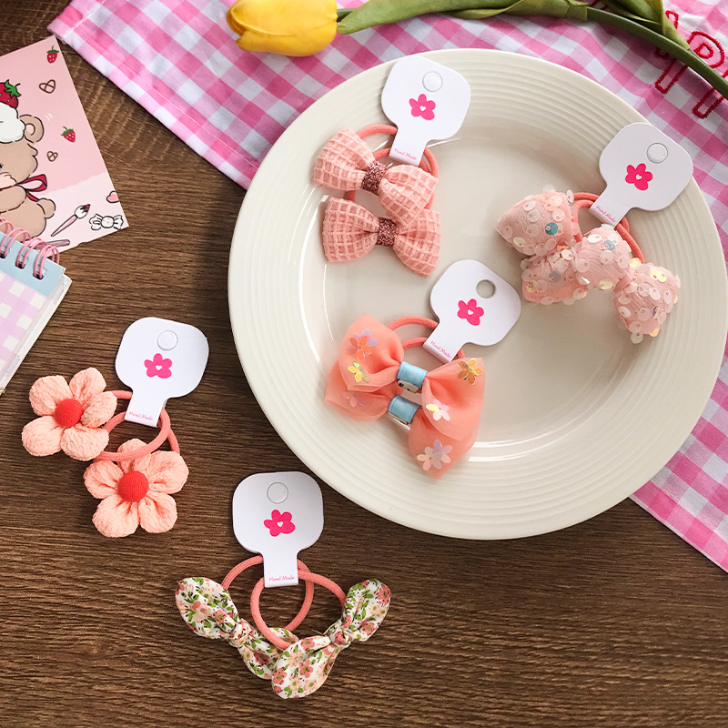 New cute bow flower sequined fabric children's hair band, high-elastic and seamless leather band children's hair accessory details Picture