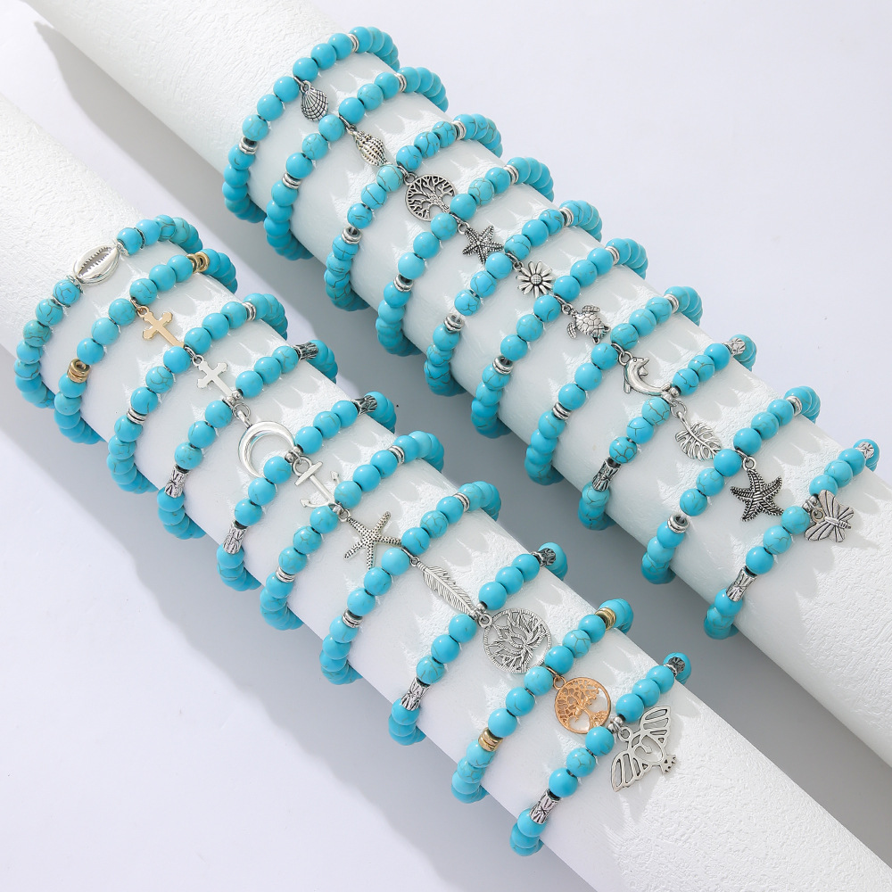 Europe And The United States Cross-Border Foreign Trade Sales Of New Fashion Women's Cross Butterfly Life Tree Leaves Turtle Pendant Turquoise Bead Elastic Bracelet Couple Bracelet Gift Manufacturers Wholesale