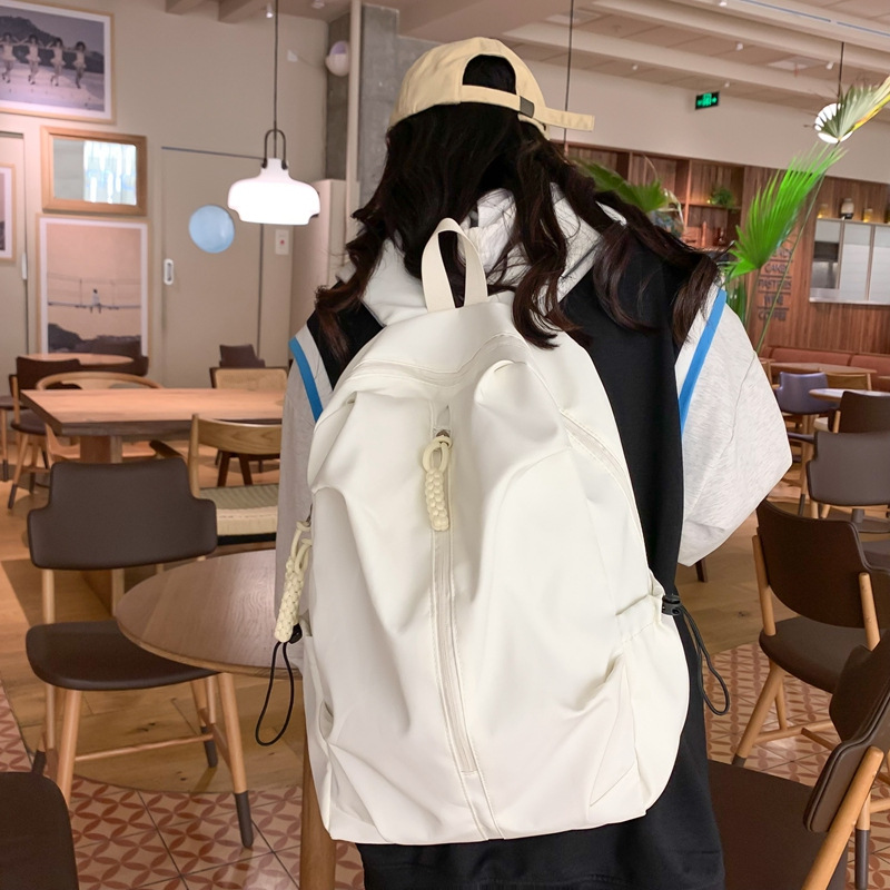 Wholesale of large-capacity schoolbags for men, women, high school and college students, simple cross-border leisure sports backpacks and travel backpacks details Picture