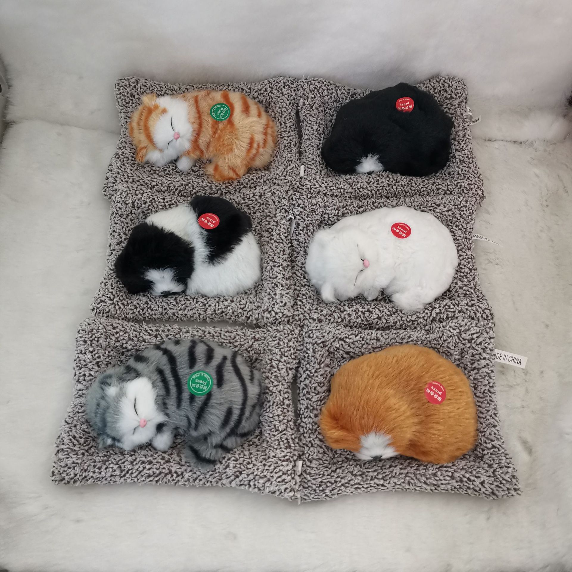 Plush simulation dogs and cats, car interior decoration items, car ornaments, car call simulation sleeping cat toys Application Scenario