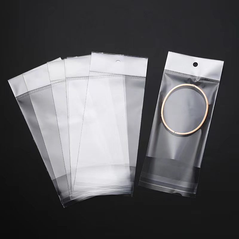 Opp White Pearl Film Card Head Bag Hanging Hole Jewelry Self-Adhesive Bag Self-Adhesive Transparent Bag Aircraft Hole Packaging Wholesale Specification drawing