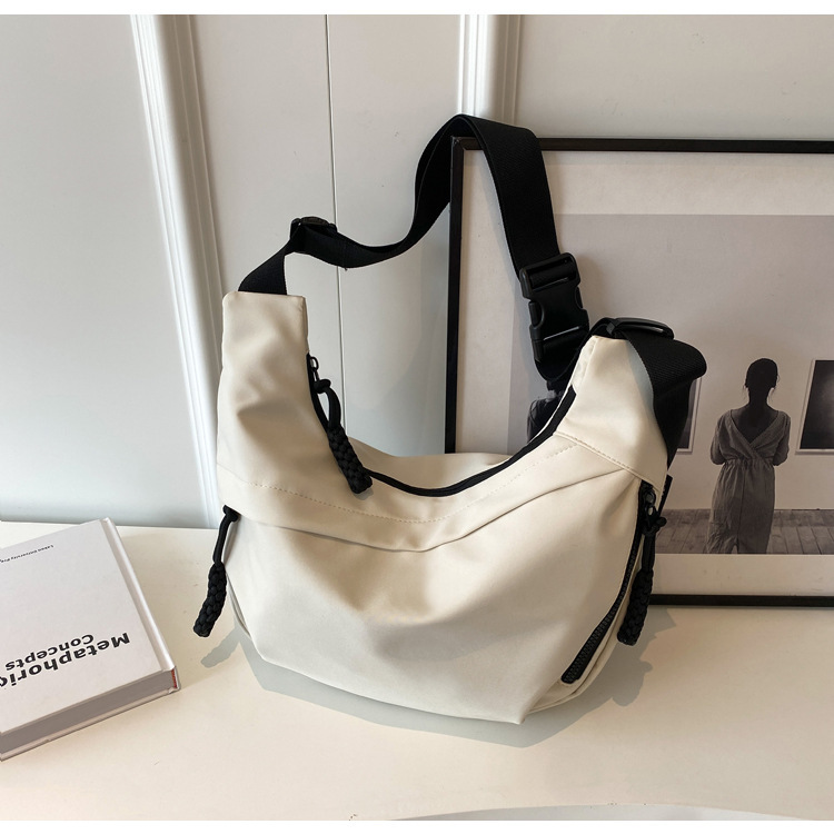 潮春新款大容量简约托特包女包单肩斜挎包时尚休闲箱包皮具男士包袋详情17