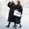 Direct sales from the manufacturer of the 2022 new style of Central Academy of Drama couple down jackets for men and women, long, knee-length, thick and loose Korean-style school uniforms details Picture
