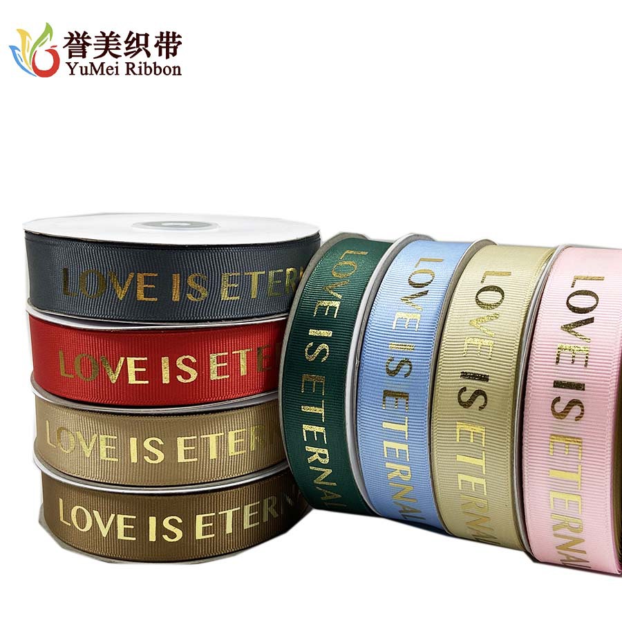 Factory wholesale of threaded gold-embossed ribbon bouquets, gift boxes, packaging straps, and personalized ribbon logo production Item Picture
