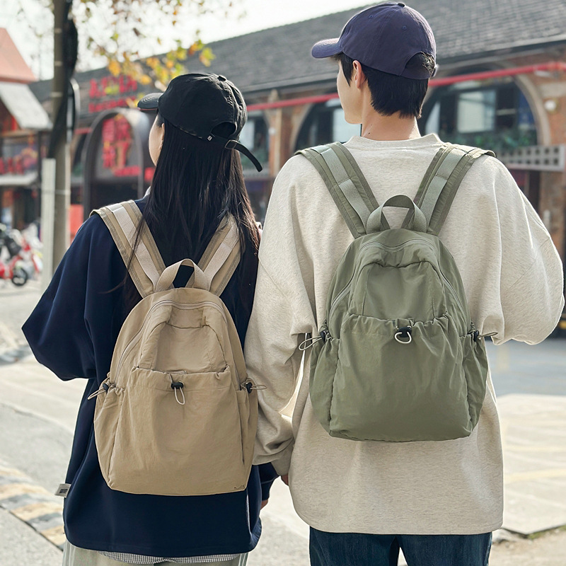 跨境男女休闲纯色双肩包新款轻便旅行小背包外贸百搭学生书包通勤
