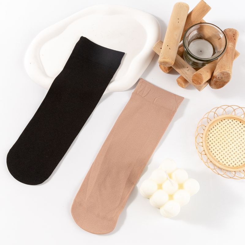 Socks women's socks in the tube stockings stockings manufacturers direct sales of a hair generation thickened men's and women's universal steel stockings socks spring and autumn thick anti-hook silk velvet flesh-colored black wide mouth short stockings details Picture