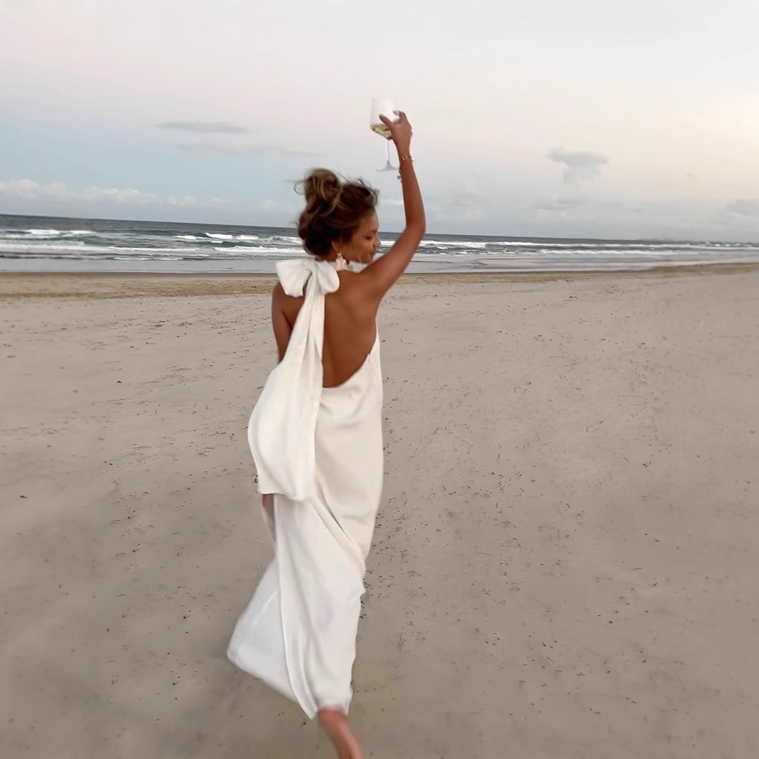 In 2025, a cross-border bestseller, a retro white crocheted halter dress with a cool summer vibe details Picture
