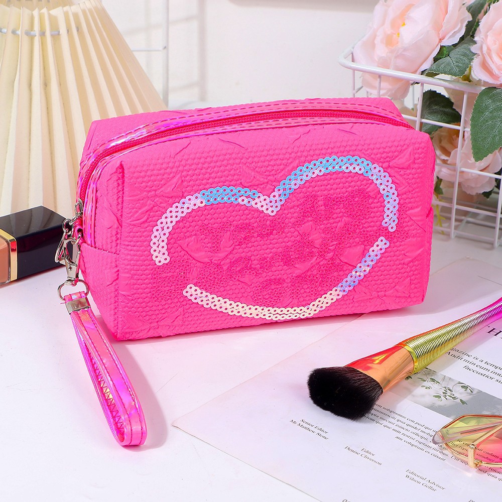 Wholesale of new cross-border sequined octagonal makeup bags, creative heart-shaped storage bags, portable travel hand-held toiletries bags details Picture