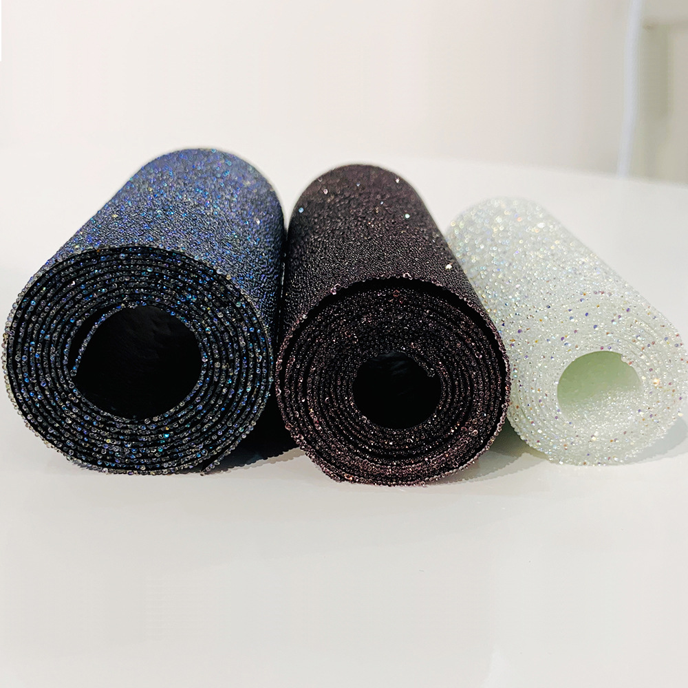 The manufacturer's rhinestone strips, self-adhesive mesh, hot diamond strips, crystal decorative fabric, rhinestone pieces and rhinestone tapes are self-bonded into hot melt