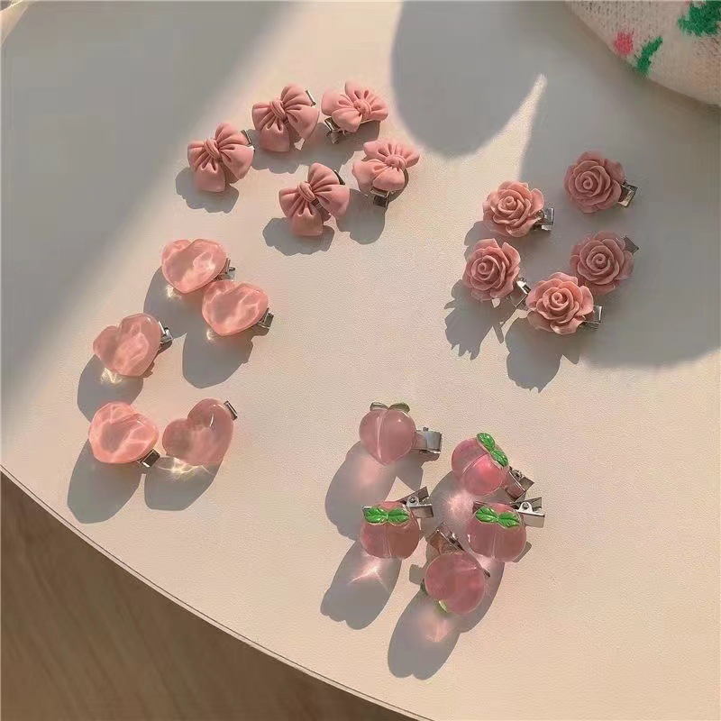 Super sweet pink hairpin series! A young girl with a bow, a peach, camellia, wavy peach heart, and a hair accessory at the edge details Picture