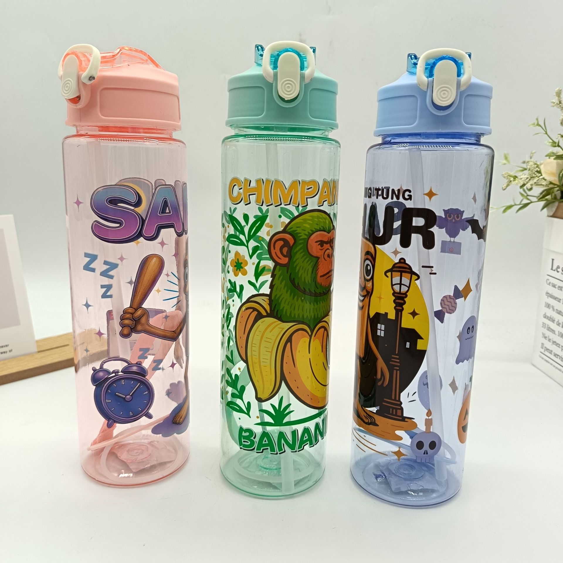 Children's water cups with cute patterns, straw cups, Shan Hai Jing style, men's and women's high appearance level sports water bottles, portable student wholesale details Picture