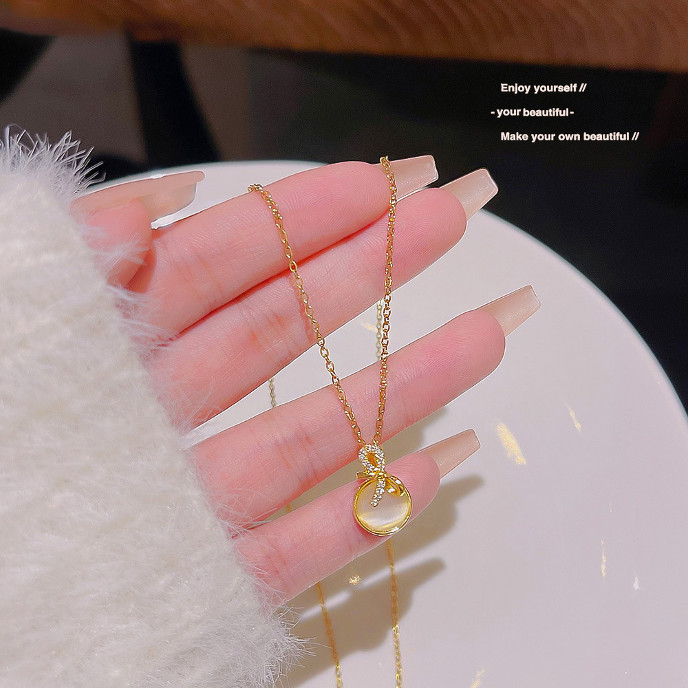 Korean Web Red Bow Necklace Titanium Steel Simple Personality Design Sense Cat's Eye Collarbone Chain Hot Accessories Wholesale