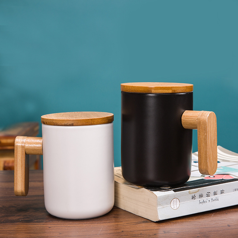 Ceramic mug with a lid and wooden handle