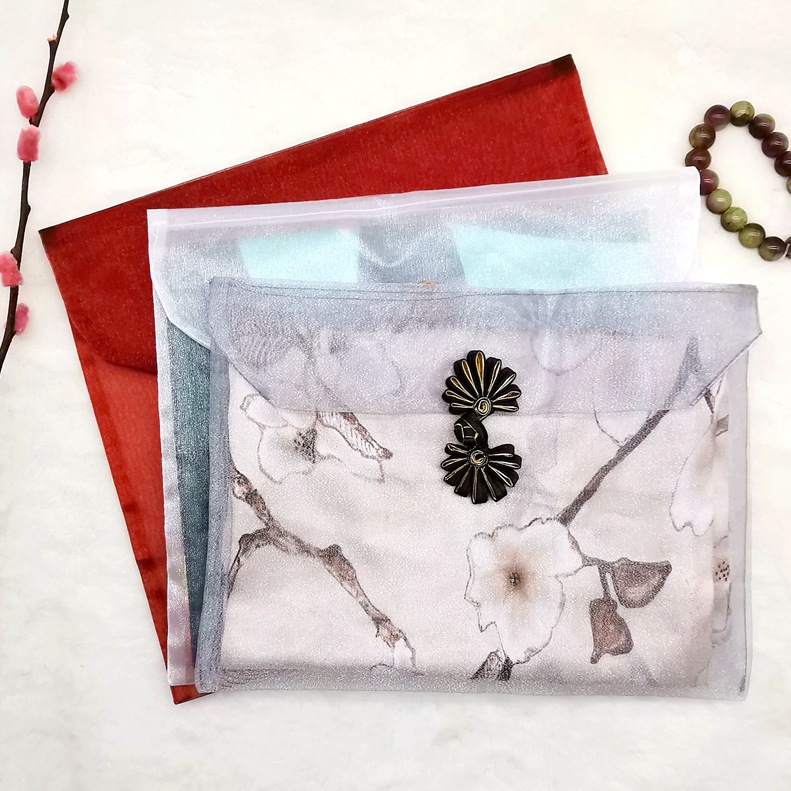 Factory direct sales of solid-color gauze bags, flip cover button-down gauze bags, cheongsam clothing gift bags, organsha silk scarf storage bags