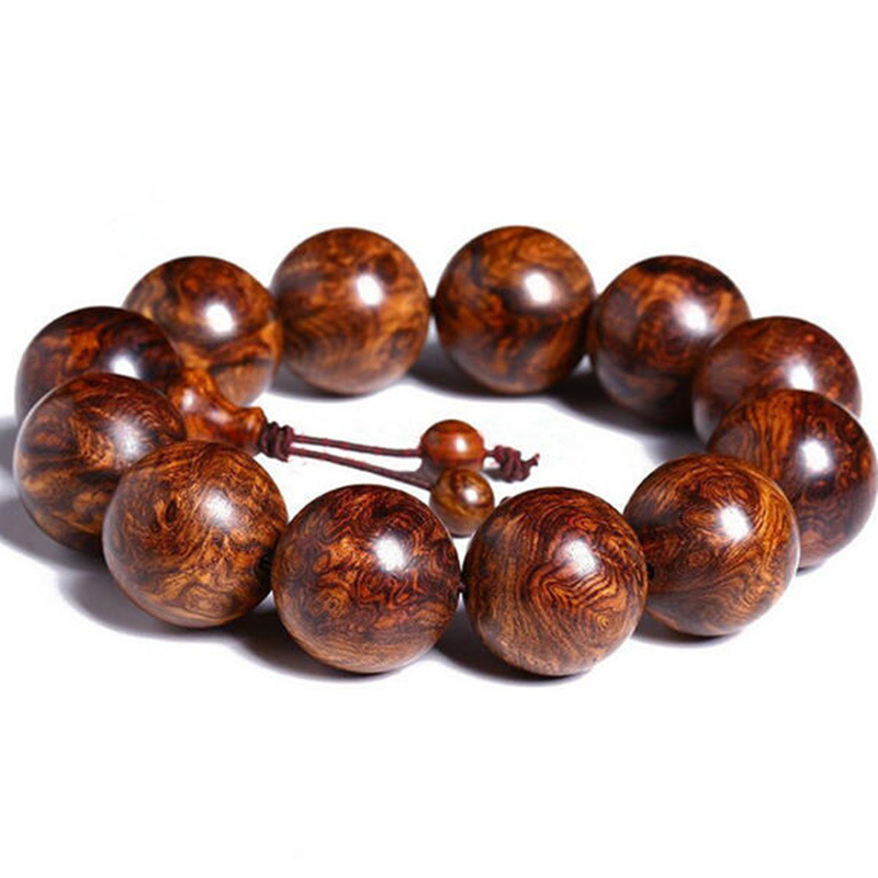 Authentic Hainan yellow rosewood and oil pear old material bracelet 2.0 Hainan Yellow Ghost Face Ghost Eye Bracelet for men and women, Buddhist prayer beads Item Picture