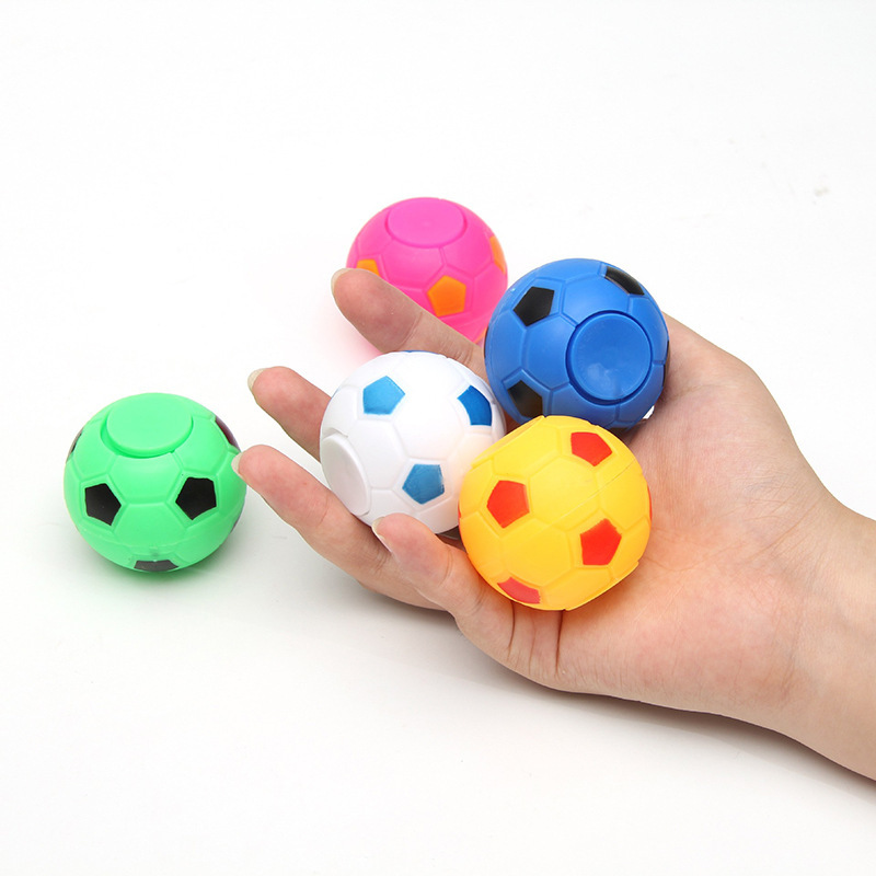 Cross-border children creative decompression finger gyro twist egg toy 35mm vent stress relief football fidget spinner wholesale Item Picture